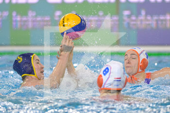 2021-01-22 - 3 AKILBAYEVA Aizhan [ROLE: Wing] (Kazakhstan) vs 4 VAN DER SLOOT Sabrina [ROLE: Wing] (Netherlands)  - WOMEN'S WATERPOLO OLYMPIC GAME QUALIFICATION TOURNAMENT 2021 - NETHERLANDS VS KAZAKHSTAN - OLYMPIC TROPHY - WATERPOLO