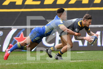 2021-04-03 - Wasps fullback Matteo Minozzi (15) is tackled on the line by ASM Clermont Auvergne full back Kotaro Matsushima (15) during the European Rugby Champions Cup, round of 16, rugby union match between Wasps and ASM Clermont Auvergne on April 3, 2021 at the Ricoh Arena in Coventry, England - Photo Dennis Goodwin / ProSportsImages / DPPI - WASPS VS ASM CLERMONT AUVERGNE - CHAMPIONS CUP - RUGBY