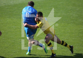 2021-05-02 - Jack Conan of Leinster is tackled by Geoffrey Doumayrou of Stade Rochelais during the European Rugby Champions Cup, semi final rugby union match between Stade Rochelais and Leinster Rugby on May 2, 2021 at Marcel Deflandre stadium in La Rochelle, France - Photo Laurent Lairys / DPPI - STADE ROCHELAIS VS LEINSTER RUGBY - CHAMPIONS CUP - RUGBY