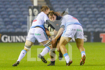 2020-11-09 - Pierre Schoeman (1) of Edinburgh Rugby is tackled by Will Boyde (8) and Brad Thyer (1) of Cardiff Blues during the Guinness Pro 14 rugby union match between Edinburgh Rugby and Cardiff Blues on November 9, 2020 at BT Murrayfield Stadium in Edinburgh, Scotland - Photo Malcolm Mackenzie / ProSportsImages / DPPI - EDINBURGH RUGBY VS CARDIFF BLUES - GUINNESS PRO 14 - RUGBY