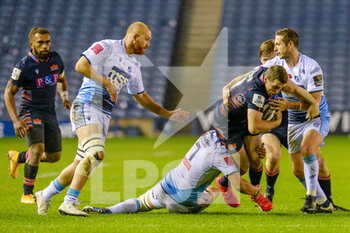 2020-11-09 - Mark Bennett (13) of Edinburgh Rugby is tackled by Olly Robinson (7) of Cardiff Blues and Jason Tovey (10) of Cardiff Blues during the Guinness Pro 14 rugby union match between Edinburgh Rugby and Cardiff Blues on November 9, 2020 at BT Murrayfield Stadium in Edinburgh, Scotland - Photo Malcolm Mackenzie / ProSportsImages / DPPI - EDINBURGH RUGBY VS CARDIFF BLUES - GUINNESS PRO 14 - RUGBY