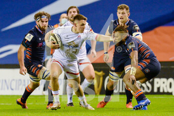 2020-11-30 - James Hume (13) of Ulster Rugby tries to fend off Eroni Sau (14) of Edinburgh Rugby during the Guinness Pro 14 rugby union match between Edinburgh Rugby and Ulster Rugby on November 30, 2020 at BT Murrayfield stadium in Edinburgh, Scotland - Photo Malcolm Mackenzie / ProSportsImages / DPPI - EDINBURGH RUGBY VS ULSTER RUGBY - GUINNESS PRO 14 - RUGBY