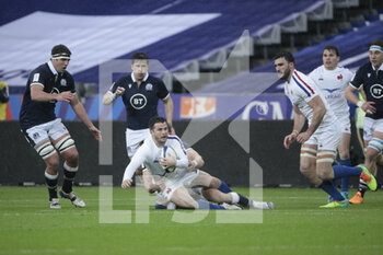 2021-03-26 - Swan REBBADJ (FRA) watched by Duhan van der Merwe (SCO) during the 2021 Six Nations, rugby union match between France and Scotland on March 26, 2021 at Stade de France in Saint-Denis near Paris, France - Photo Stephane Allaman / DPPI - 2021 GUINNESS SIX NATIONS RUGBY - FRANCE VS SCOTLAND - SIX NATIONS - RUGBY