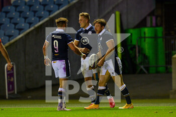 2020-10-23 - Hamish Watson of Scotland scores in the corner and is congratulated by Ali Price (9) and Duhan ven der Merwe (11) of Scotland during the Rugby International Test match between Scotland and Georgia on October 23, 2020 at BT Murrayfield in Edinburgh, Scotland - Photo Malcolm Mackenzie / ProSportsImages / DPPI - SCOTLAND VS GEORGIA - TEST MATCH - RUGBY