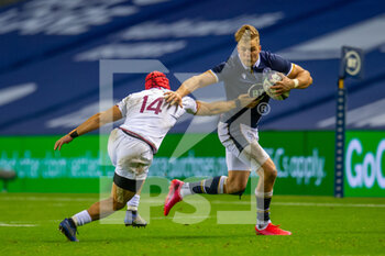 2020-10-23 - Duhan ven der Merwe of Scotland tries to evade the tackle of Akaki Tabutsadze (14) of Georgia during the Rugby International Test match between Scotland and Georgia on October 23, 2020 at BT Murrayfield in Edinburgh, Scotland - Photo Malcolm Mackenzie / ProSportsImages / DPPI - SCOTLAND VS GEORGIA - TEST MATCH - RUGBY