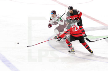 2021-05-21 - contrast N. Paul (Canada) and R. Abols (Latvia) - WORLD CHAMPIONSHIP 2021 - CANADA VS LATVIA - ICE HOCKEY - WINTER SPORTS