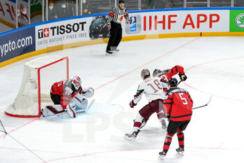 2021-05-21 - Shot on goal by R. Abols (Latvia), with contrast from M. Ferraro and J. Bernard-Docker (Canada) - WORLD CHAMPIONSHIP 2021 - CANADA VS LATVIA - ICE HOCKEY - WINTER SPORTS