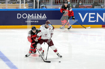 2021-05-21 - Contrast between L. Darzins (Latvia) and C. Miller (Canada) - WORLD CHAMPIONSHIP 2021 - CANADA VS LATVIA - ICE HOCKEY - WINTER SPORTS