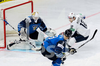 2021-05-22 - Olkinuora (Finland)  defending goal against Moore (USA) - WORLD CHAMPIONSHIP 2021 - FINLAND VS USA - ICE HOCKEY - WINTER SPORTS