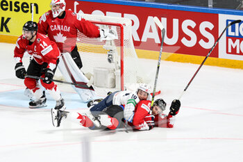 2021-05-23 - Bunting (canada)  and Miller (Canada) defending goal from Robertson (USA)  - WORLD CHAMPIONSHIP 2021 - CANADA VS USA - ICE HOCKEY - WINTER SPORTS