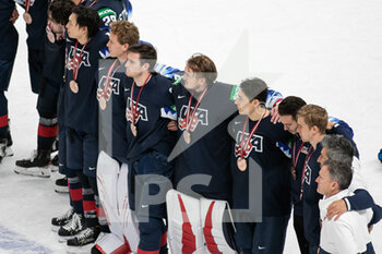 2021-06-06 - Team USA after celebrating the win of bronze medal 
National Anthem  - WORLD CHAMPIONSHIP 2021 - THIRD POSITION - USA VS GERMANY - ICE HOCKEY - WINTER SPORTS