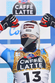 2021-02-13 - Suisse’s Lara Gut-Behrami reacts on the podium - 2021 FIS ALPINE WORLD SKI CHAMPIONSHIPS - DOWNHILL - WOMEN - ALPINE SKIING - WINTER SPORTS