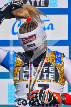 2021-02-13 - Suisse’s Lara Gut-Behrami, bronze medal, shakes her hair on the podium - 2021 FIS ALPINE WORLD SKI CHAMPIONSHIPS - DOWNHILL - WOMEN - ALPINE SKIING - WINTER SPORTS
