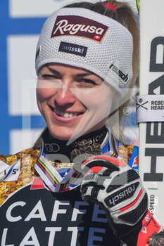 2021-02-13 - Suisse’s Lara Gut-Behrami smiles on the podium with her Bronze Medal  - 2021 FIS ALPINE WORLD SKI CHAMPIONSHIPS - DOWNHILL - WOMEN - ALPINE SKIING - WINTER SPORTS