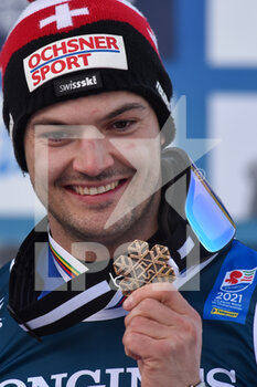2021-02-15 - Suisse‚Äôs Loic Meillard shows his Bronze Medal - 2021 FIS ALPINE WORLD SKI CHAMPIONSHIPS - ALPINE COMBINED - MEN - ALPINE SKIING - WINTER SPORTS