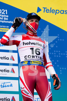 2021-02-19 - Marco Schwarz (AUT) on the podium with the bronze medal - 2021 FIS ALPINE WORLD SKI CHAMPIONSHIPS - GIANT SLALOM - MEN - ALPINE SKIING - WINTER SPORTS