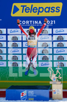 2021-02-20 - Katharina Liensberger (AUT) jumps in celebration on the podium - 2021 FIS ALPINE WORLD SKI CHAMPIONSHIPS - SLALOM - WOMEN - ALPINE SKIING - WINTER SPORTS