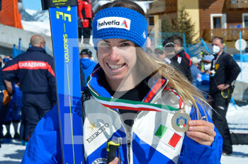 2021-03-24 - Happiness of Marta Bassino the winner of Giant Slalom during the award ceremony  - CAMPIONATI ITALIANI ASSOLUTI DI SCI ALPINO 2021 - ALPINE SKIING - WINTER SPORTS