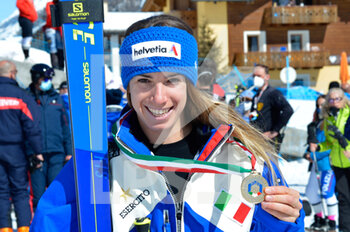 2021-03-24 - Happiness of Marta Bassino the winner of Giant Slalom during the award ceremony  - CAMPIONATI ITALIANI ASSOLUTI DI SCI ALPINO 2021 - ALPINE SKIING - WINTER SPORTS