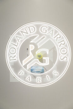2020-09-21 - Illustration of official tennis ball Roland Garros 2020 by Wilson with Roland Garros lighting logotype pictured with chirurgical protector mask, swab sample, tube of physiological liquid under the CoVid health crisis 19 during the Roland Garros 2020, Grand Slam tennis tournament, Qualifying, on September 21, 2020 at Roland Garros stadium in Paris, France - Photo Stephane Allaman / DPPI - ROLAND GARROS 2020, GRAND SLAM - QUALIFYING - INTERNATIONALS - TENNIS
