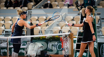 2020-09-29 - Laura Siegemund of Germany and Kristina Mladenovic of France at the net after the first round at the Roland Garros 2020, Grand Slam tennis tournament, on September 29, 2020 at Roland Garros stadium in Paris, France - Photo Rob Prange / Spain DPPI / DPPI - ROLAND GARROS 2020, GRAND SLAM TOURNAMENT - INTERNATIONALS - TENNIS