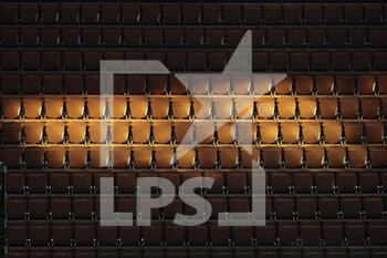 2020-10-05 - Spectator seats illuminated by a ray of sunlight penetrating through the side rooftop openings of Philippe Chatrier stadium during the Roland Garros 2020, Grand Slam tennis tournament, on October 5, 2020 at Roland Garros stadium in Paris, France - Photo Stephane Allaman / DPPI - ROLAND GARROS 2020, GRAND SLAM TOURNAMENT - INTERNATIONALS - TENNIS