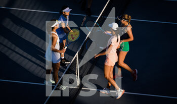 2021-01-12 - Ena Shibahara and Shuko Aoyama of Japan in action during their doubles semifinal match at the 2021 Abu Dhabi WTA Women's Tennis Open WTA 500 tournament on January 12, 2021 in Abu Dhabi, United Arab Emirates - Photo Rob Prange / Spain DPPI / DPPI - 2021 ABU DHABI WTA WOMEN'S TENNIS OPEN WTA 500 TOURNAMENT - SEMIFINAL - INTERNATIONALS - TENNIS