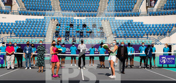 2021-01-13 - Veronika Kudermetova of Russia and Aryna Sabalenka of Belarus with their trophy flowers after the final of the 2021 Abu Dhabi WTA Women's Tennis Open WTA 500 tournament on January 13, 2021 in Abu Dhabi, United Arab Emirates - Photo Rob Prange / Spain DPPI / DPPI -  2021 ABU DHABI WTA WOMEN'S TENNIS OPEN WTA 500 TOURNAMENT - DOUBLES FINAL - INTERNATIONALS - TENNIS