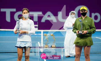 2021-03-05 - Monica Niculescu of Romania and Jelena Ostapenko of Latvia with the runner up trophy after the doubles final of the 2021 Qatar Total Open, WTA 500 tennis tournament on March 5, 2021 at the Khalifa International Tennis and Squash Complex in Doha, Qatar - Photo Rob Prange / Spain DPPI / DPPI - LICHAR OF THE UNITED2021 QATAR TOTAL OPEN, WTA 500 TENNIS TOURNAMENT - INTERNATIONALS - TENNIS