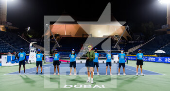 2021-03-13 - Garbine Muguruza of Spain with the champions trophy after the final of the 2021 Dubai Duty Free Tennis Championships WTA 1000 tournament on March 13, 2021 at the Dubai Duty Free Tennis Stadium in Dubai, United Arab Emirates - Photo Rob Prange / Spain DPPI / DPPI - 2021 DUBAI DUTY FREE TENNIS CHAMPIONSHIPS WTA 1000 TOURNAMENT - INTERNATIONALS - TENNIS