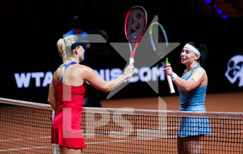 2021-04-21 - Angelique Kerber of Germany and Ekaterine Gorgodze of Georgia at the net after their first-round match at the 2021 Porsche Tennis Grand Prix, WTA 500 tournament on April 21, 2021 at Porsche Arena in Stuttgart, Germany - Photo Rob Prange / Spain DPPI / DPPI - 2021 PORSCHE TENNIS GRAND PRIX, WTA 500 TOURNAMENT - INTERNATIONALS - TENNIS