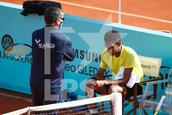 2021-04-30 - Toni Nadal, head coach, talks to Felix Auger-Aliassime of Canada during his practice on day two of the Mutua Madrid Open 2021, Masters 1000 tennis tournament on April 30, 2021 at La Caja Magica in Madrid, Spain - Photo Oscar J Barroso / Spain DPPI / DPPI - MUTUA MADRID OPEN 2021, MASTERS 1000 TENNIS TOURNAMENT - INTERNATIONALS - TENNIS