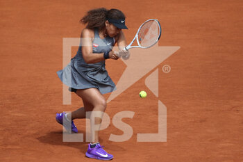 2021-04-30 - Naomi Osaka of Japan in action during his Women's Singles match against Misaki Doi of Japan on day two of the Mutua Madrid Open 2021, Masters 1000 tennis tournament on April 30, 2021 at La Caja Magica in Madrid, Spain - Photo Oscar J Barroso / Spain DPPI / DPPI - MUTUA MADRID OPEN 2021, MASTERS 1000 TENNIS TOURNAMENT - INTERNATIONALS - TENNIS