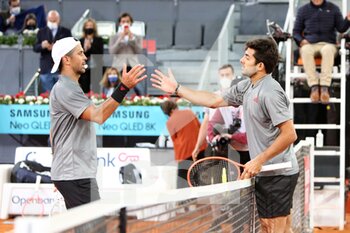 2021-05-03 - Fernando Verdasco of Spain and Cristian Garin of Chile during the Mutua Madrid Open 2021, Masters 1000 tennis tournament on May 3, 2021 at La Caja Magica in Madrid, Spain - Photo Laurent Lairys / DPPI - MUTUA MADRID OPEN 2021, MASTERS 1000 TENNIS TOURNAMENT - INTERNATIONALS - TENNIS