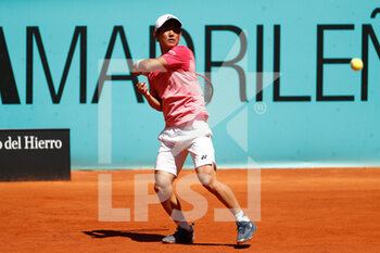 2021-05-04 - Yoshihito Nishioka of Japan in action during his Men's Singles match, round of 64, against Filip Krajinovic of Serbia on the Mutua Madrid Open 2021, Masters 1000 tennis tournament on May 4, 2021 at La Caja Magica in Madrid, Spain - Photo Oscar J Barroso / Spain DPPI / DPPI - MUTUA MADRID OPEN 2021, MASTERS 1000 TENNIS TOURNAMENT - INTERNATIONALS - TENNIS