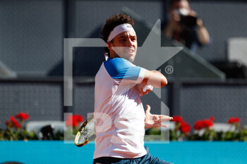2021-05-04 - Marco Cecchinato of Italy in action during his Men's Singles match, round of 64, against Roberto Bautista Agut of Spain on the Mutua Madrid Open 2021, Masters 1000 tennis tournament on May 4, 2021 at La Caja Magica in Madrid, Spain - Photo Oscar J Barroso / Spain DPPI / DPPI - MUTUA MADRID OPEN 2021, MASTERS 1000 TENNIS TOURNAMENT - INTERNATIONALS - TENNIS