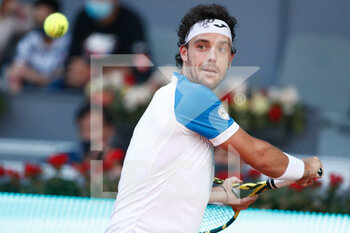 2021-05-04 - Marco Cecchinato of Italy in action during his Men's Singles match, round of 64, against Roberto Bautista Agut of Spain on the Mutua Madrid Open 2021, Masters 1000 tennis tournament on May 4, 2021 at La Caja Magica in Madrid, Spain - Photo Oscar J Barroso / Spain DPPI / DPPI - MUTUA MADRID OPEN 2021, MASTERS 1000 TENNIS TOURNAMENT - INTERNATIONALS - TENNIS