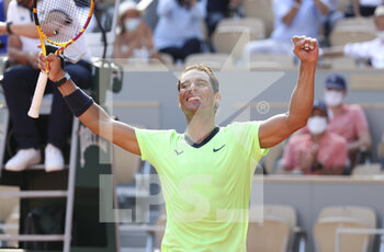 2021-06-09 - Rafael Nadal of Spain celebrates his victory during day 11 of the French Open 2021, Grand Slam tennis tournament on June 9, 2021 at Roland-Garros stadium in Paris, France - Photo Jean Catuffe / DPPI - ROLAND-GARROS 2021, GRAND SLAM TENNIS TOURNAMENT - INTERNATIONALS - TENNIS