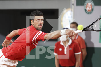 2021-06-09 - Novak Djokovic of Serbia during day 11 of the French Open 2021, Grand Slam tennis tournament on June 9, 2021 at Roland-Garros stadium in Paris, France - Photo Jean Catuffe / DPPI - ROLAND-GARROS 2021, GRAND SLAM TENNIS TOURNAMENT - INTERNATIONALS - TENNIS