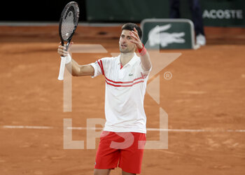 2021-06-11 - Novak Djokovic of Serbia celebrates his semi-final victory against Rafael Nadal of Spain during day 13 of Roland-Garros 2021, French Open 2021, a Grand Slam tennis tournament on June 11, 2021 at Roland-Garros stadium in Paris, France - Photo Jean Catuffe / DPPI - ROLAND-GARROS 2021, FRENCH OPEN 2021, A GRAND SLAM TENNIS TOURNAMENT - INTERNATIONALS - TENNIS