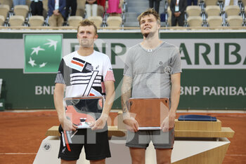 2021-06-12 - Finalists Andrey Golubev and Alexander Bublik of Kazakhstan during the Men's Doubles final trophy ceremony on day 14 of Roland-Garros 2021, French Open 2021, a Grand Slam tennis tournament on June 12, 2021 at Roland-Garros stadium in Paris, France - Photo Jean Catuffe / DPPI - ROLAND-GARROS 2021, FRENCH OPEN 2021, A GRAND SLAM TENNIS TOURNAMENT - INTERNATIONALS - TENNIS