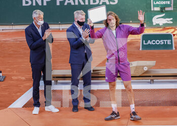 2021-06-13 - President of French Tennis Federation FFT Gilles Moretton, Jim Courier, Stefanos Tsitsipas of Greece during the trophy ceremony of the men's final at Roland-Garros 2021, Grand Slam tennis tournament on June 13, 2021 at Roland-Garros stadium in Paris, France - Photo Nicol Knightman / DPPI - ROLAND-GARROS 2021, FRENCH OPEN 2021, A GRAND SLAM TENNIS TOURNAMENT - INTERNATIONALS - TENNIS