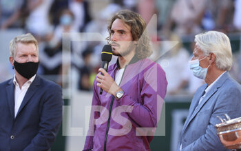 2021-06-13 - Finalist Stefanos Tsitsipas of Greece between Jim Courier and Bjorn Borg during the trophy ceremony of the men's final on day 15 of Roland-Garros 2021, French Open 2021, a Grand Slam tennis tournament on June 13, 2021 at Roland-Garros stadium in Paris, France - Photo Jean Catuffe / DPPI - ROLAND-GARROS 2021, FRENCH OPEN 2021, A GRAND SLAM TENNIS TOURNAMENT - INTERNATIONALS - TENNIS