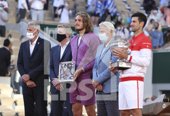 2021-06-13 - From left, President of French Tennis Federation FFT Gilles Moretton, Jim Courier, finalist Stefanos Tsitsipas of Greece, Bjorn Borg, winner Novak Djokovic of Serbia during the trophy ceremony of the men's final on day 15 of Roland-Garros 2021, French Open 2021, a Grand Slam tennis tournament on June 13, 2021 at Roland-Garros stadium in Paris, France - Photo Jean Catuffe / DPPI - ROLAND-GARROS 2021, FRENCH OPEN 2021, A GRAND SLAM TENNIS TOURNAMENT - INTERNATIONALS - TENNIS