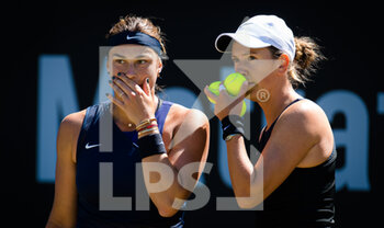 2021-06-14 - Aryna Sabalenka and Victoria Azarenka of Belarus playing doubles at the 2021 bett1open WTA 500 tennis tournament on June 14, 2021 at Rot-Weiss Tennis Club in Berlin, Germany - Photo Rob Prange / Spain DPPI / DPPI - 2021 BETT1OPEN WTA 500 TENNIS TOURNAMENT - INTERNATIONALS - TENNIS
