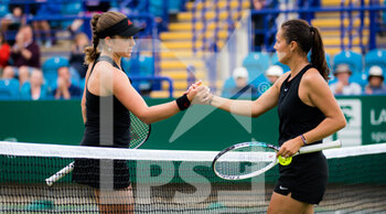 2021-06-23 - Jelena Ostapenko of Latvia and Daria Kasatkina of Russia after their quarter-final match at the 2021 Viking International WTA 500 tennis tournament on June 24, 2021 at Devonshire Park Tennis in Eastbourne, England - Photo Rob Prange / Spain DPPI / DPPI - 2021 VIKING INTERNATIONAL WTA 500 TENNIS TOURNAMENT - INTERNATIONALS - TENNIS