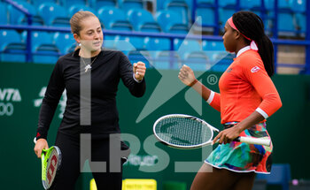 2021-06-23 - Jelena Ostapenko of Latvia and Cori Gauff of the United States play doubles at the 2021 Viking International WTA 500 tennis tournament on June 24, 2021 at Devonshire Park Tennis in Eastbourne, England - Photo Rob Prange / Spain DPPI / DPPI - 2021 VIKING INTERNATIONAL WTA 500 TENNIS TOURNAMENT - INTERNATIONALS - TENNIS