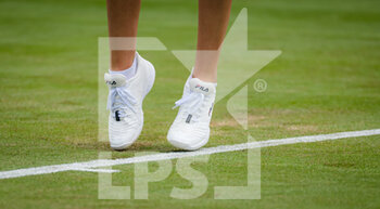 2021-06-28 - Karolina Pliskova of the Czech Republic in action against Tamara Zidansek of Slovenia, shoes illustration during the first round of The Championships Wimbledon 2021, Grand Slam tennis tournament on June 29, 2021 at All England Lawn Tennis and Croquet Club in London, England - Photo Rob Prange / Spain DPPI / DPPI - WIMBLEDON 2021, GRAND SLAM TENNIS TOURNAMENT - INTERNATIONALS - TENNIS