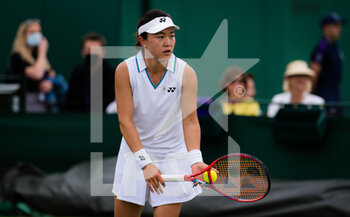 2021-06-28 - Zhu Lin of China in action against Mona Barthel of Germany during the first round of The Championships Wimbledon 2021, Grand Slam tennis tournament on June 29, 2021 at All England Lawn Tennis and Croquet Club in London, England - Photo Rob Prange / Spain DPPI / DPPI - WIMBLEDON 2021, GRAND SLAM TENNIS TOURNAMENT - INTERNATIONALS - TENNIS