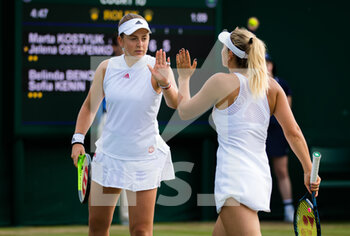 2021-07-02 - Marta Kostyuk of Ukraine and Jelena Ostapenko of Latvia playing doubles at The Championships Wimbledon 2021, Grand Slam tennis tournament on July 2, 2021 at All England Lawn Tennis and Croquet Club in London, England - Photo Rob Prange / Spain DPPI / DPPI - WIMBLEDON 2021, GRAND SLAM TENNIS TOURNAMENT - INTERNATIONALS - TENNIS